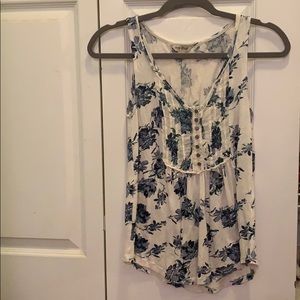 White top with blue flowers